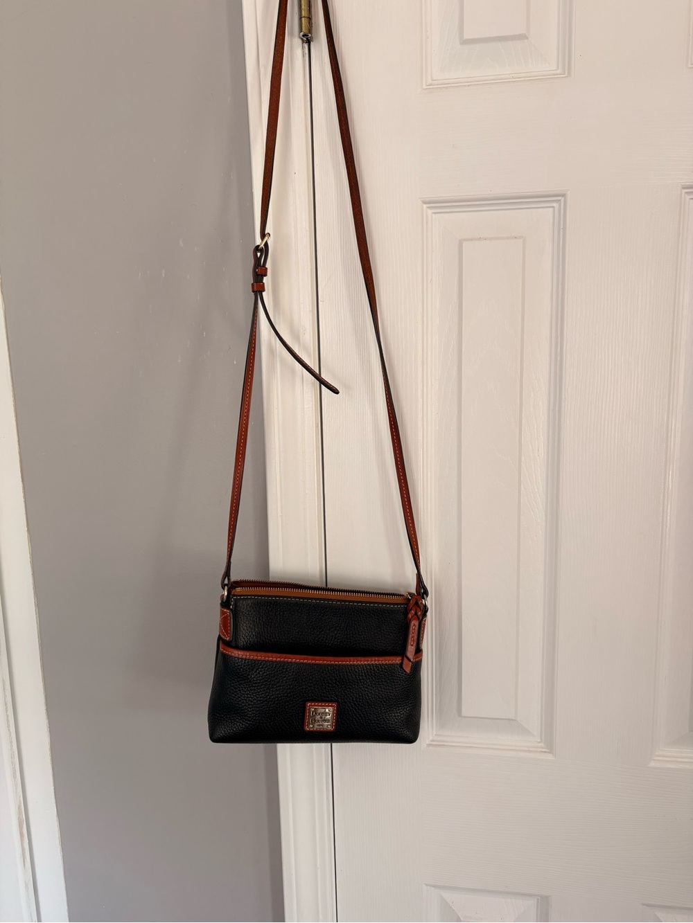 Dooney & Bourke Black Pebbled Leather Crossbody with Brown Trim and Strap